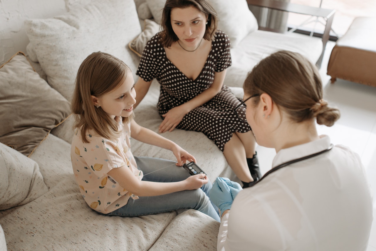 patient and doctor at home