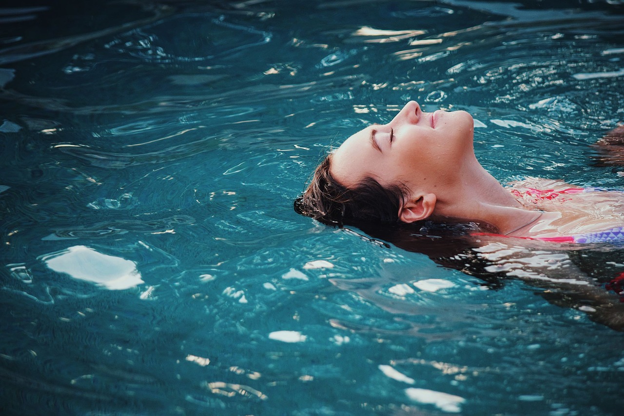 Girl doing Hydrotherapy in swimming pool